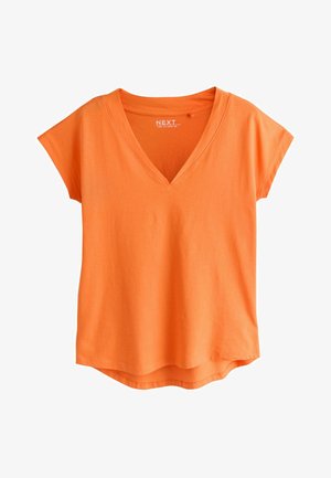 Lyhythihainen kirkkaan oranssi V-pääntie, jossa hieman kaareva helma, valmistettu pehmeästä puuvillakankaasta.