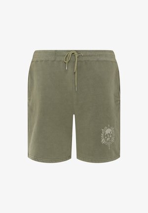 Shorts homme vert olive avec taille élastique, cordon, poches latérales et petit motif de crâne entouré de feuilles et de flèches croisées sur la jambe gauche.