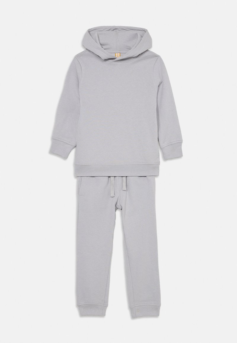 Grijze katoenen hoodie en joggerset met een ontspannen pasvorm, lange mouwen, een trekkoord in de taille en geribbelde manchetten. Gladde textuur, geen patronen.