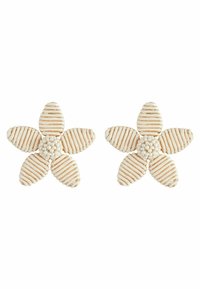 Flower-shaped earrings made of white material with gold stripes and a textured center, featuring five petals.