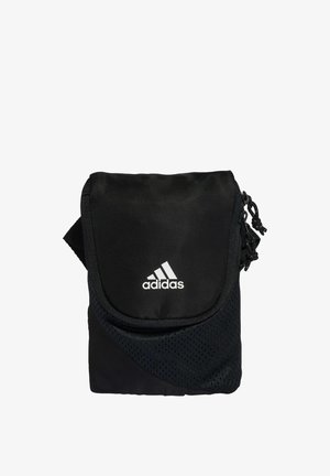 Sac bandoulière noir Adidas avec fermeture à rabat et poche avant en mesh, avec le logo blanc Adidas centré sur le rabat.