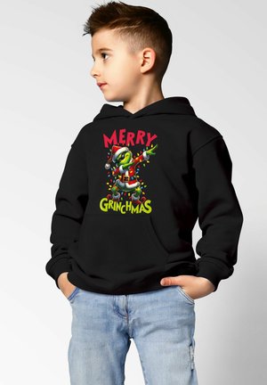 Schwarzer Hoodie mit einem grafischen Motiv, das eine grüne Figur im Weihnachtsmann-Outfit zeigt, umgeben von bunten Lichtern und dem Text "FROHE GRINCHMAS".