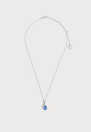 Collier chaîne en argent avec un petit pendentif en pierre précieuse bleue ovale et un fermoir ajustable avec un charme en forme de triangle.