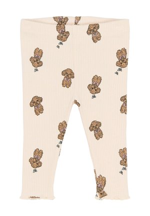 Cremefarvede ribbede leggings med et gentaget mønster af teddybjørnsmotiver med lyserøde sløjfer, afsluttet med flæser ved anklerne.