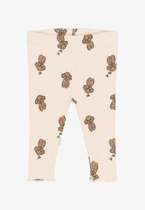 Krém színű bordás leggings, amelyet ismétlődő teddy mackó minták díszítenek, rózsaszín masnikkal, az alsókán fodros passzékkal.