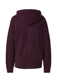 Sweat à capuche en violet profond, fabriqué en tissu tricoté doux. Présente une coupe ample, des poignets et un ourlet côtelés. Sans marque ni motifs visibles.