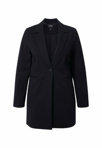 Blazer nero sartoriale con chiusura a un bottone, rever a punta e tasche laterali. Realizzato in un tessuto liscio con maniche lunghe.