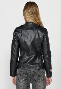 Koroshi Giacca in similpelle - black