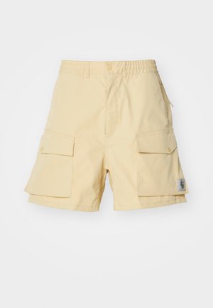 Keltaiset cargo-shortsit, jotka on valmistettu kevyestä kankaasta. Shortsissa on kaksi suurta sivutaskua, joustava vyötärö ja pieni logopaketti sivussa.