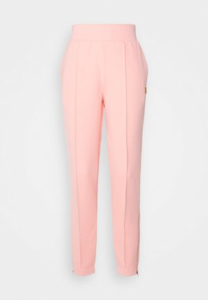 Pantalones de chándal rosas con una cinturilla elástica ancha, piernas ajustadas, costuras laterales y cremalleras en los tobillos. Fabricados en una tela suave y elástica.