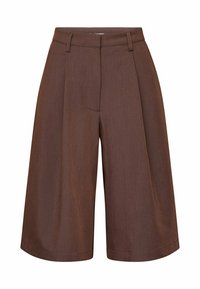 Brune shorts med vidde, plisserede, lavet af et tekstureret stof. Har bæltestropper og en enkelt lomme foran.