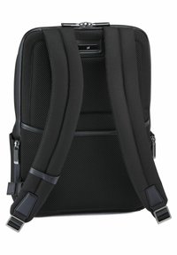 Black backpack with padded mesh back, adjustable straps, zippered compartments, and sleek hardware accents. Sturdy fabric with a textured finish.