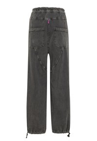 Schwarz verwaschene High-Waist-Hose mit elastischem Bund, zwei großen Gesäßtaschen und Kordelzügen an den Knöcheln.