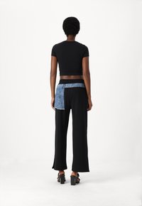 Karl Lagerfeld Jeans RELAXED MIXED PANT - Treningo apatinė dalis - black denim