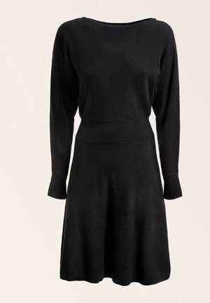 Stickad klänning - black