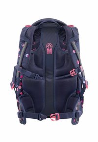 Navy blue backpack with pink accents, mesh back support, adjustable straps, and colorful polka dot patterns. Features multiple buckles.