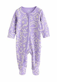 Combinaison côtelée violette avec des motifs abstraits blancs, incluant des fleurs et des visages, avec une fermeture éclair à l'avant et un design à pieds.