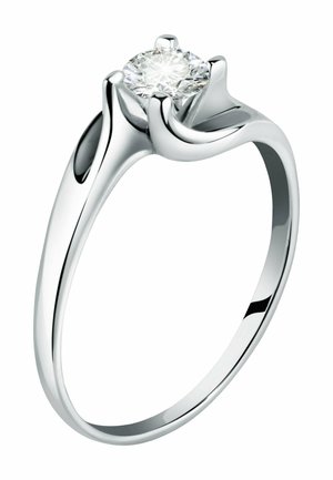 Silver engagement ring featuring a prong setting with a round, clear diamond. Smooth, polished band with subtle curves and minimalistic design.