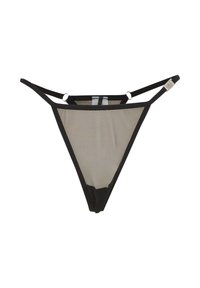 String en résille noire avec fines bretelles et petits accessoires circulaires en métal. Présente une forme triangulaire et un matériau transparent à l'arrière.