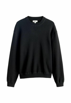 Black sweatshirt made from soft fabric. Features a ribbed crew neckline, drop shoulders, and ribbed cuffs and hem. Simple design, no patterns.