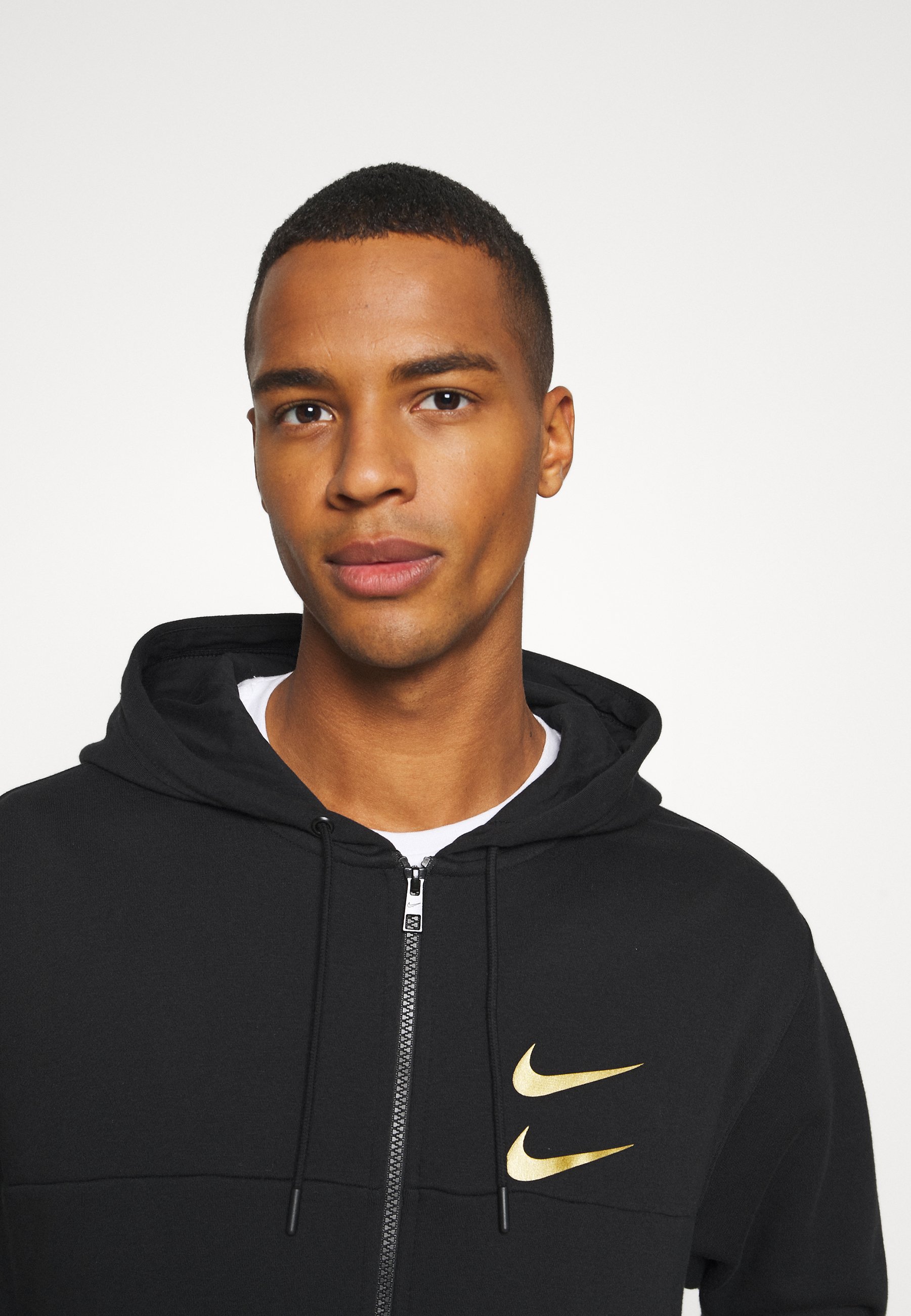 black and gold nike pullover