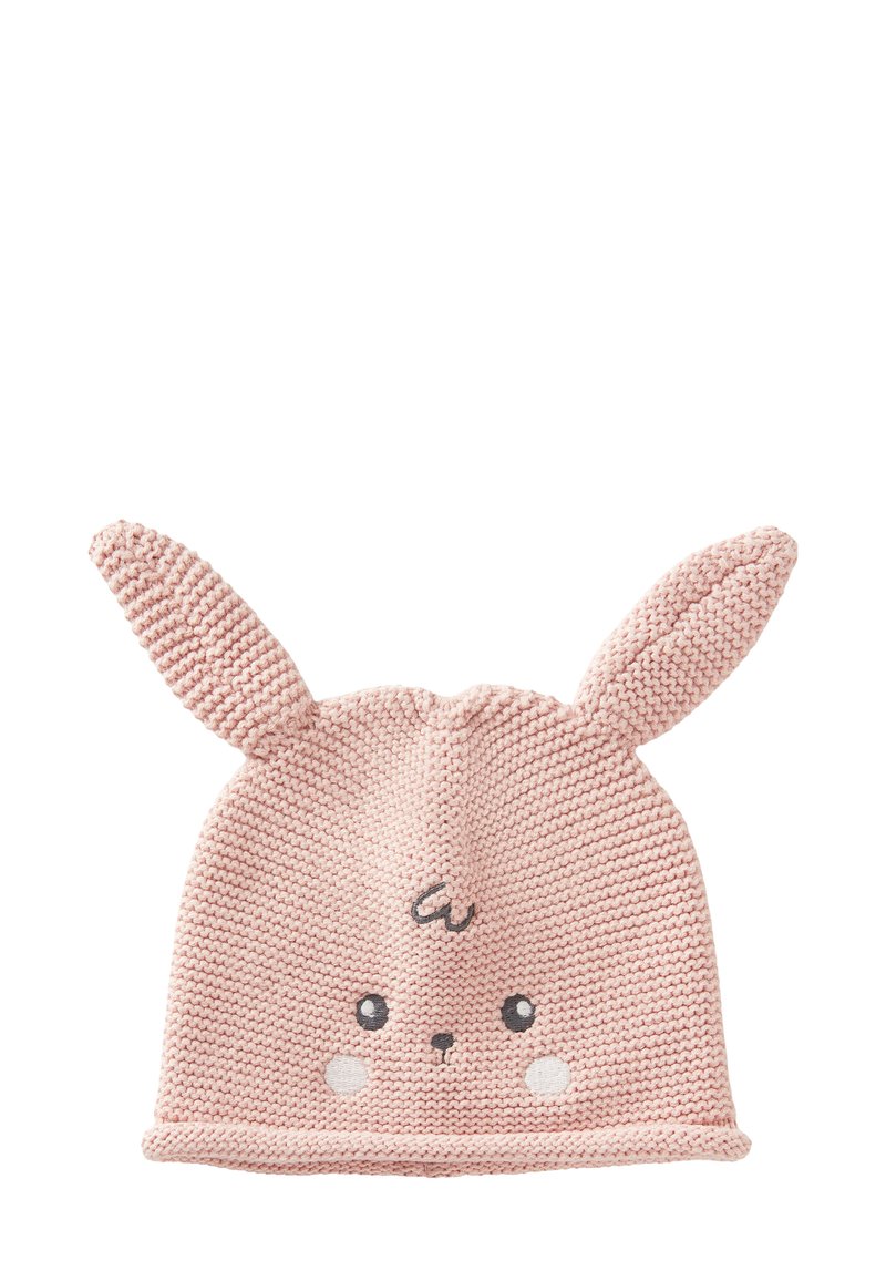 Pletená růžová čepice s ušima králíčka, kulatým obličejem, vyšívanýma očima a tvářičkami s nádechem červeni. Měkká textura a zakončena žebrovaným lemem.