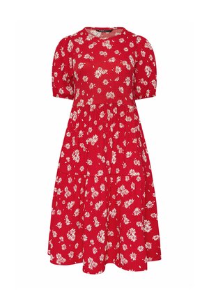 Punainen midimekko, jossa valkoinen päivänkakkarakuvio, lyhyet puffsihihat, vartaloa myötäilevä yläosa ja kerätty helma.
