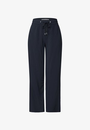 Granatowe dresy wykonane z miękkiego materiału, z elastycznym pasem ze sznurkiem i luźnym krojem. Gładka faktura, z bocznymi kieszeniami.