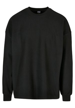 Sort langærmet ribbet sweatshirt med rund hals og løs pasform. Har stribet stof og tætsiddende manchetter. Ingen grafiske detaljer.