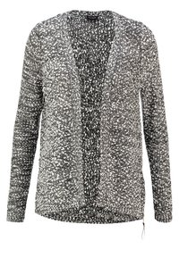 Stickad cardigan i svart och vitt med en lös passform, öppen framsida, långa ärmar och subtil textur genom hela plagget. Dragkedjedetalj i nederkant.