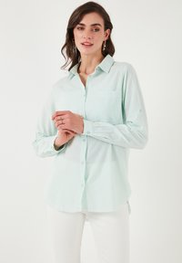 Unselected, mint