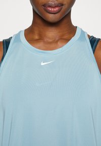 Nike Performance ONE TANK - Top - worn blue/white
