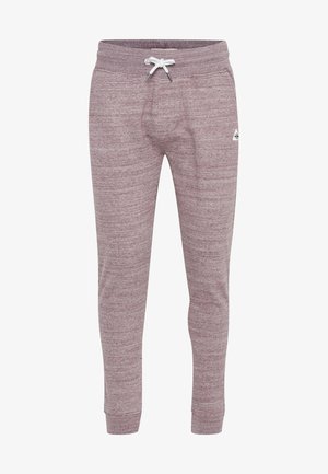 Maroon joggers made of a soft, textured fabric. Features an elastic waistband with a drawstring and tapered legs. Subtle heathered pattern.