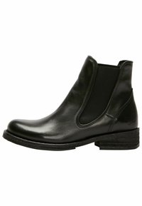 Bottine noire en cuir avec panneaux élastiques sur les côtés, bout rond, petit talon empilé et logo discret sur le côté. Texture lisse et finition brillante.