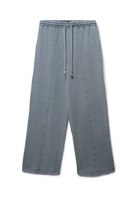 Pantalons larges gris clair avec une taille élastique, fermeture à lacets et détails de couture sur les coutures latérales. Tissu doux en mélange de coton.