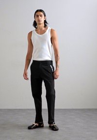 MOSCHINO PANTALONE - Stoffhose - fantasia nero