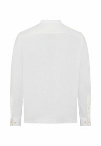 Witte langemouwen blouse van linnen met een relaxte pasvorm. Bevat een kraag, met knoopsluiting aan de manchetten en een eenvoudig, strak ontwerp aan de achterkant.
