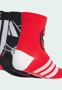 Tres pares de calcetines: rojos con diseño de Spiderman, negros con patrón de telarañas blancas y negros lisos. Mezcla de algodón, longitud media de la pantorrilla.