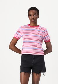 Striped t-shirt with pink, blue, and red lines, ribbed red collar and sleeve edges, featuring a small logo on the chest. Short sleeves.