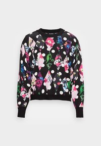 Sweater lavet af stof med en sort bund, der har et diamantmønster af farverige blomsterdesigns og store hvide prikker. Rund hals, lange ærmer.