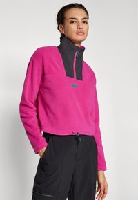 Helly Hansen DAYBREAKER CROPPED  - Vesta od flisa - magenta