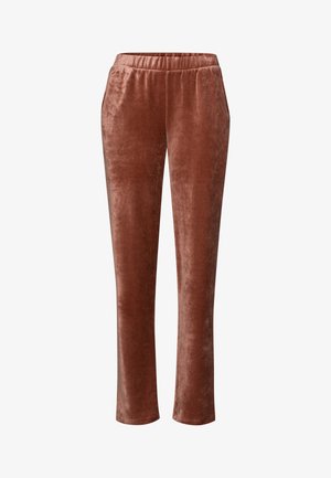 Sametihousut lämpimässä ruskeassa sävyssä, joissa on joustava vyötärö ja suorat lahkeet, pehmeällä ja sileällä pinnalla, ilman näkyviä kiinnikkeitä.