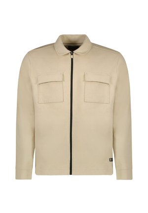 Beige jas met een kraag, ritssluiting aan de voorkant, twee borstzakken en lange mouwen. Glad materiaal met een gestroomlijnde pasvorm en geen zichtbare patronen.