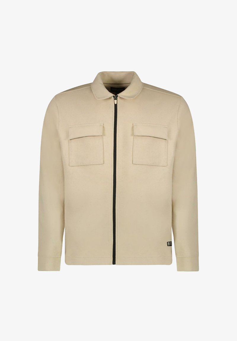 Beige jas met een kraag, ritssluiting aan de voorkant, twee borstzakken en lange mouwen. Glad materiaal met een gestroomlijnde pasvorm en geen zichtbare patronen.