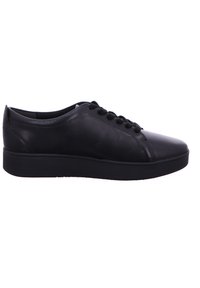 Black leather sneakers with a smooth texture, rounded toe, lace-up design, and padded collar. Features a flat rubber sole and minimal detailing.