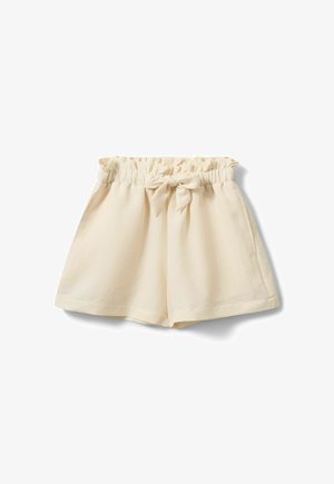 Helle, cremefarbene Shorts aus strukturiertem Stoff mit elastischem Bund und einer dekorativen Schleife, die vorne in der Mitte gebunden ist.