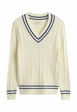 Cremefarbener V-Ausschnitt-Pullover mit Zopfmuster, mit navyblauen Streifen am Kragen, an den Bündchen und am Saum, mit einer gerippten Textur.