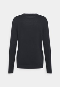 Pull noir à manches longues vu de dos avec un col rond et un design simple et épuré sur fond blanc.