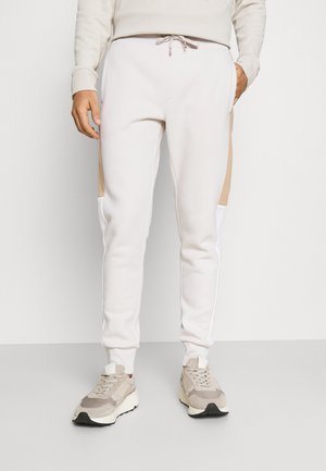 Pantalones deportivos - off-white