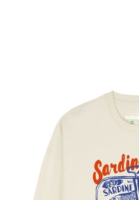 Sweatshirt crème avec le texte rouge "Sardine" et une illustration bleue d'une boîte de sardines ouverte avec des tranches de citron et des sardines à l'intérieur.